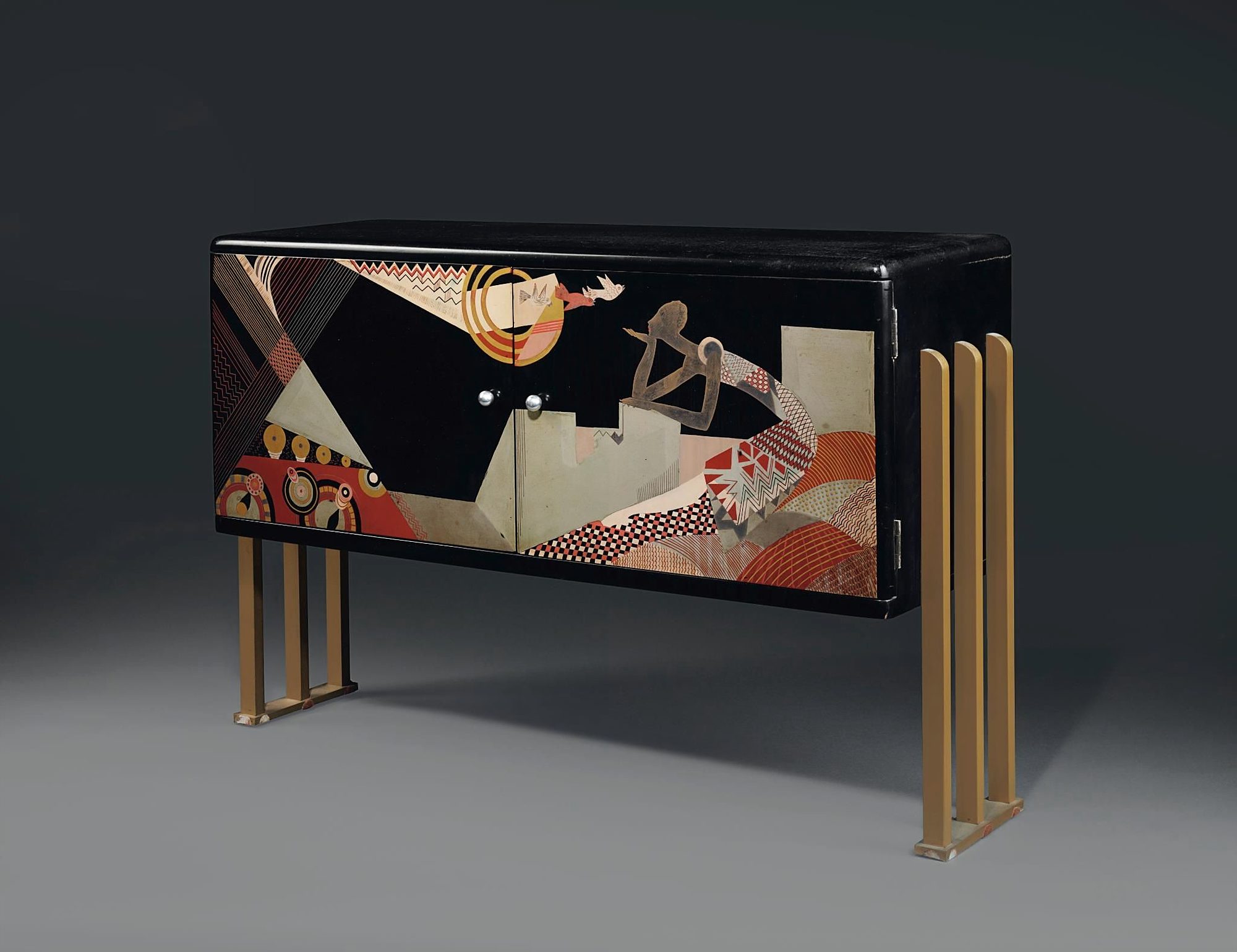 A hand-painted lacquer bar cabinet on brass legs